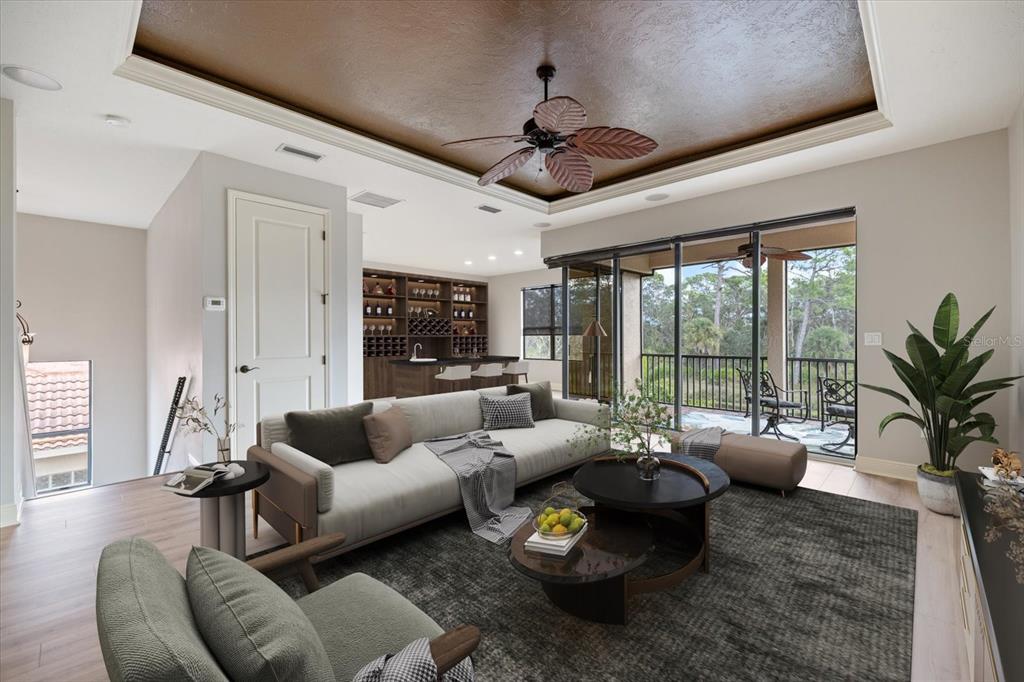 616 Crane Prairie Way Osprey, FL 34229 - Photo 33 of 54 a living room with furniture and a large window