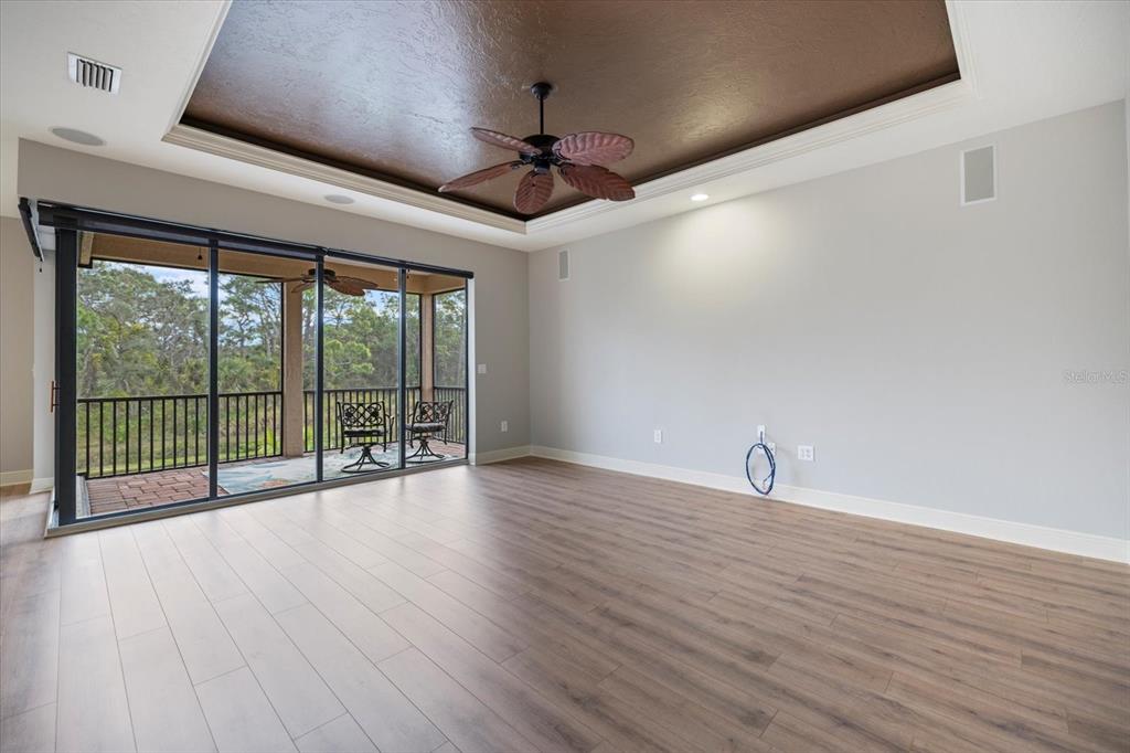 616 Crane Prairie Way Osprey, FL 34229 - Photo 36 of 54 a view of a room with wooden floor and balcony