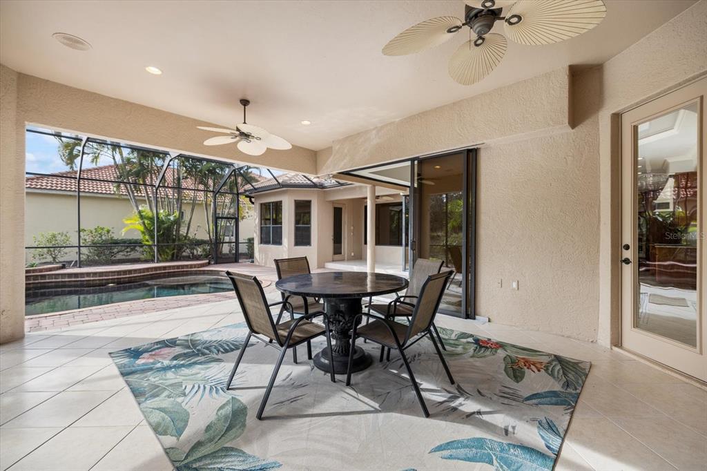 616 Crane Prairie Way Osprey, FL 34229 - Photo 45 of 54 a view of a dining room with furniture window and outside view
