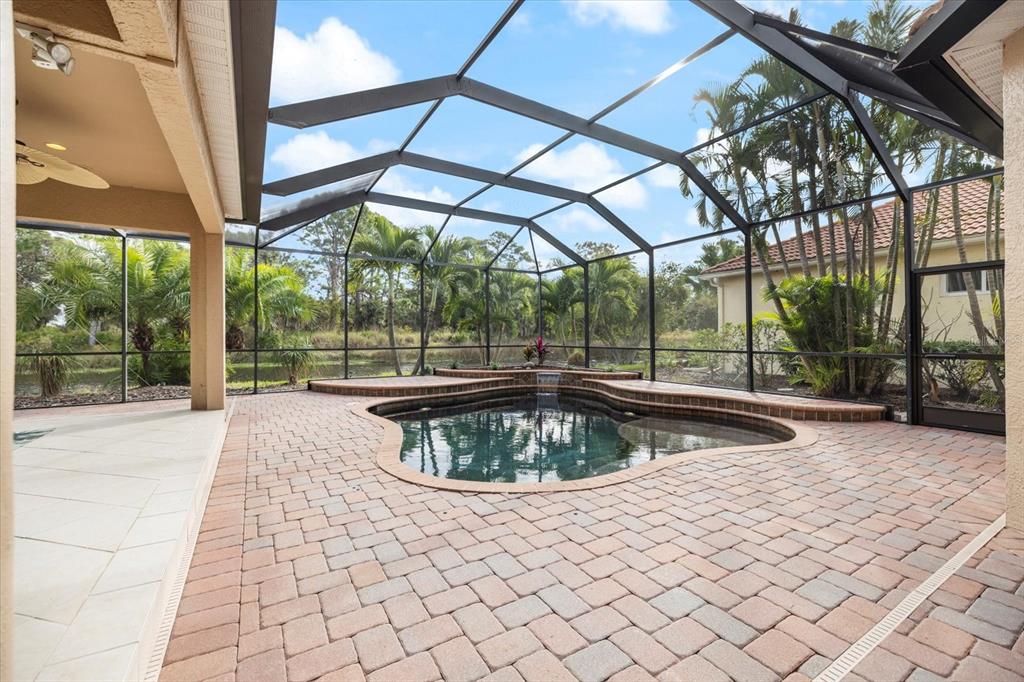 616 Crane Prairie Way Osprey, FL 34229 - Photo 46 of 54 a view of a swimming pool with a patio