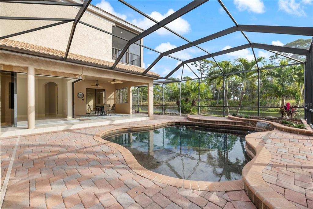 616 Crane Prairie Way Osprey, FL 34229 - Photo 48 of 54 a swimming pool with outdoor seating