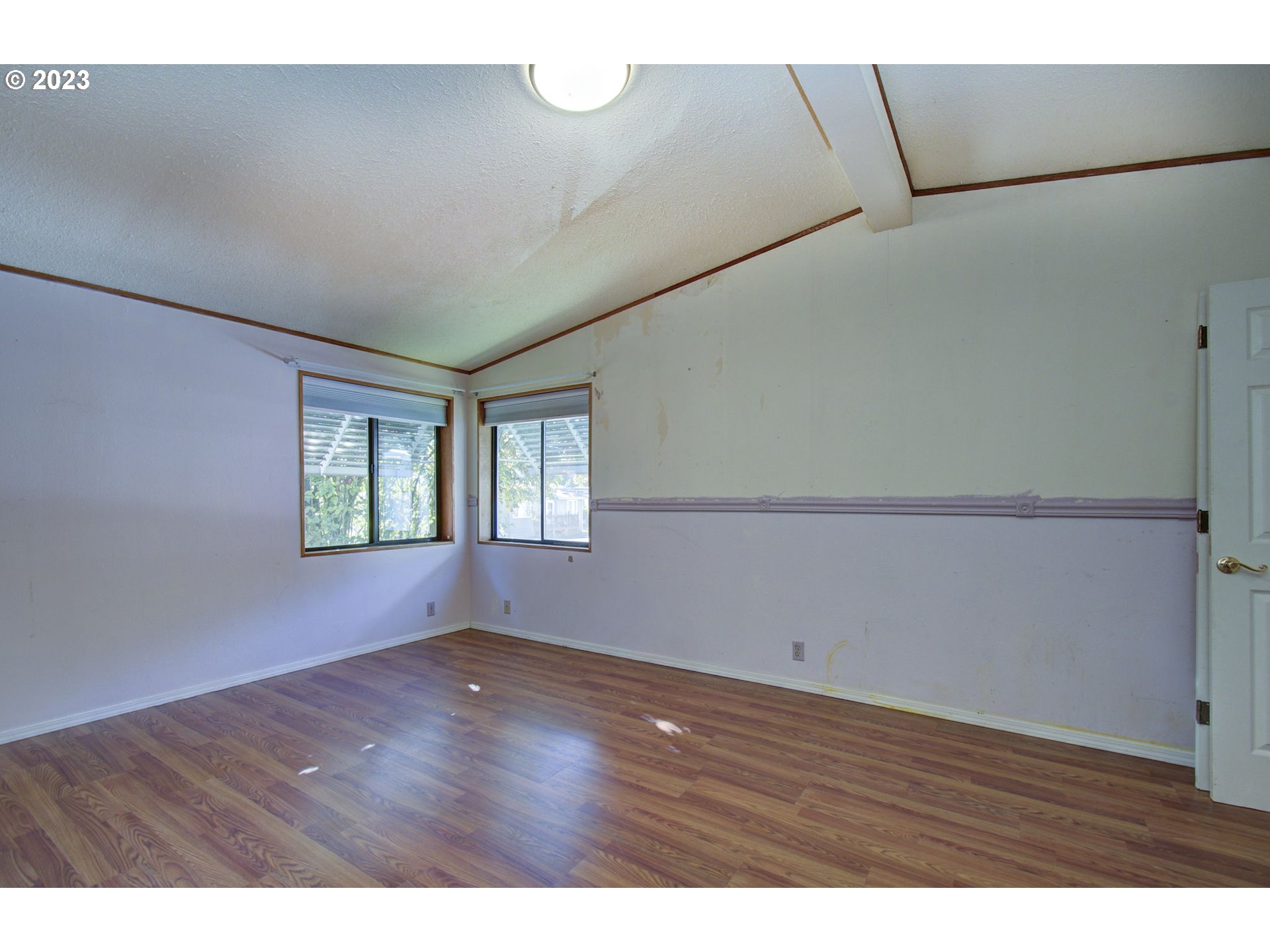 15619 Northeast Caples Road Brush Prairie, WA 98606 - Photo 21 of 27 a view of room with window and hardwood floor