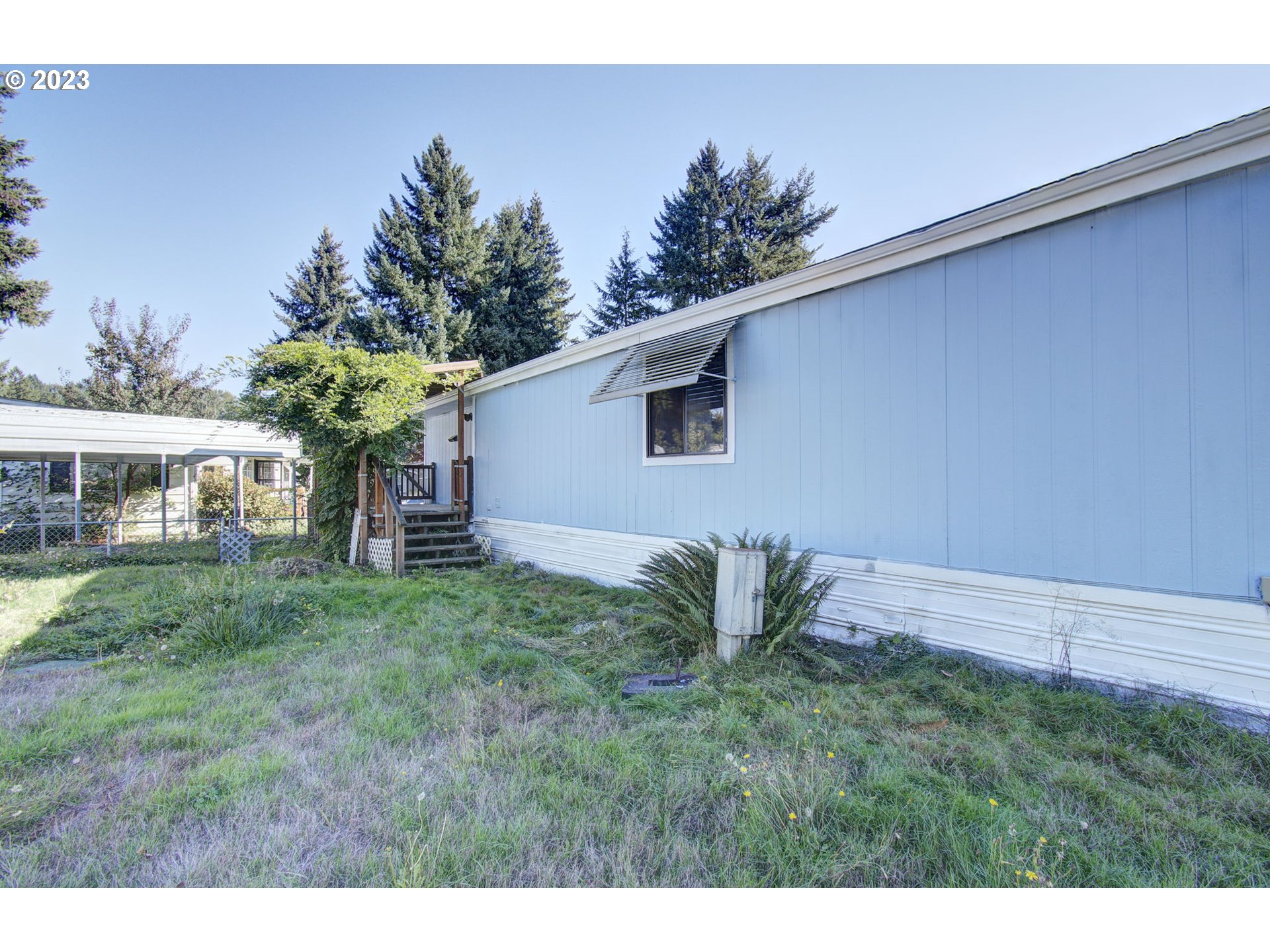 15619 Northeast Caples Road Brush Prairie, WA 98606 - Photo 23 of 27 a backyard of a house with lots of green space