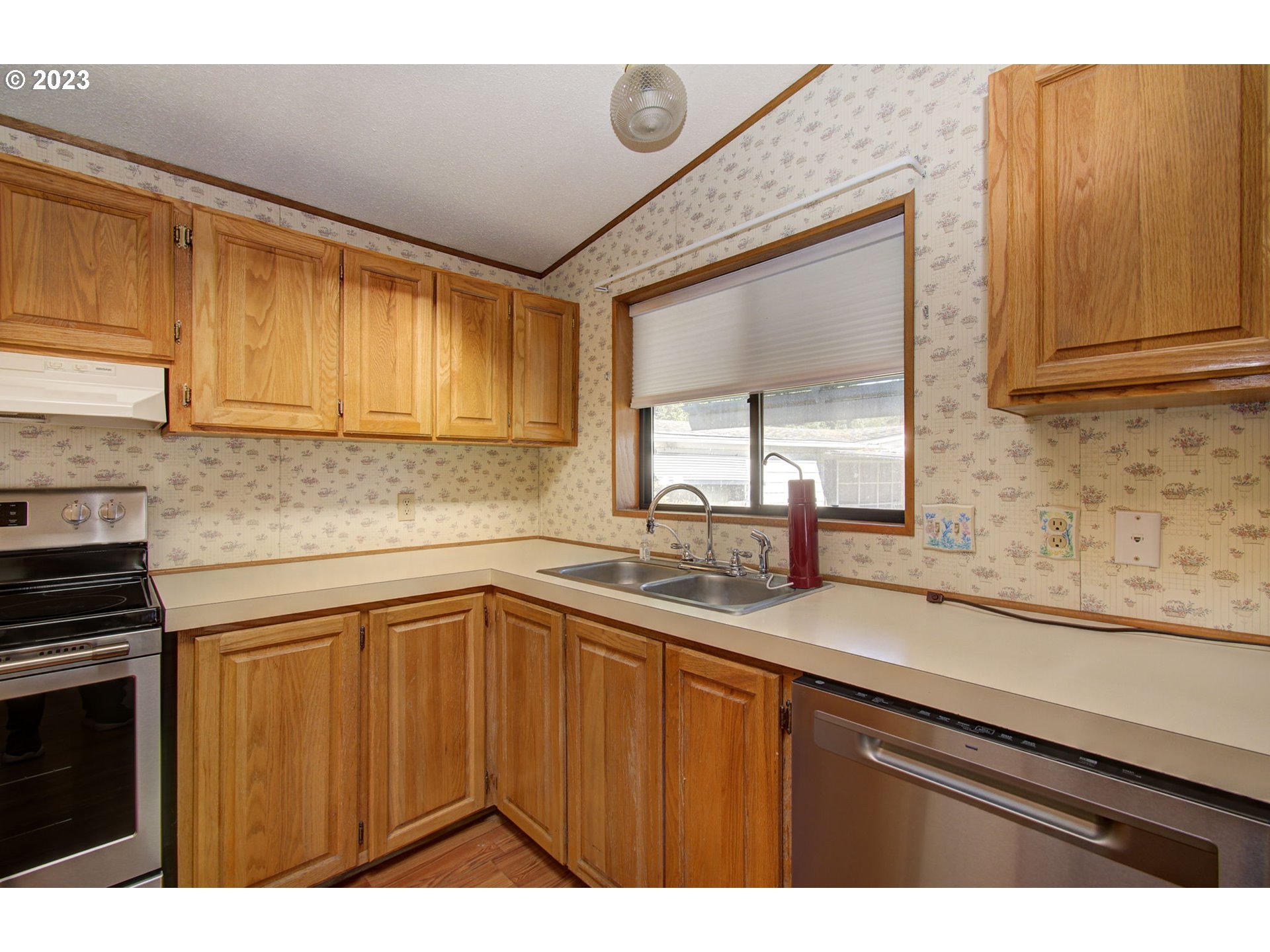 15619 Northeast Caples Road Brush Prairie, WA 98606 - Photo 9 of 27 a kitchen with a sink and cabinets