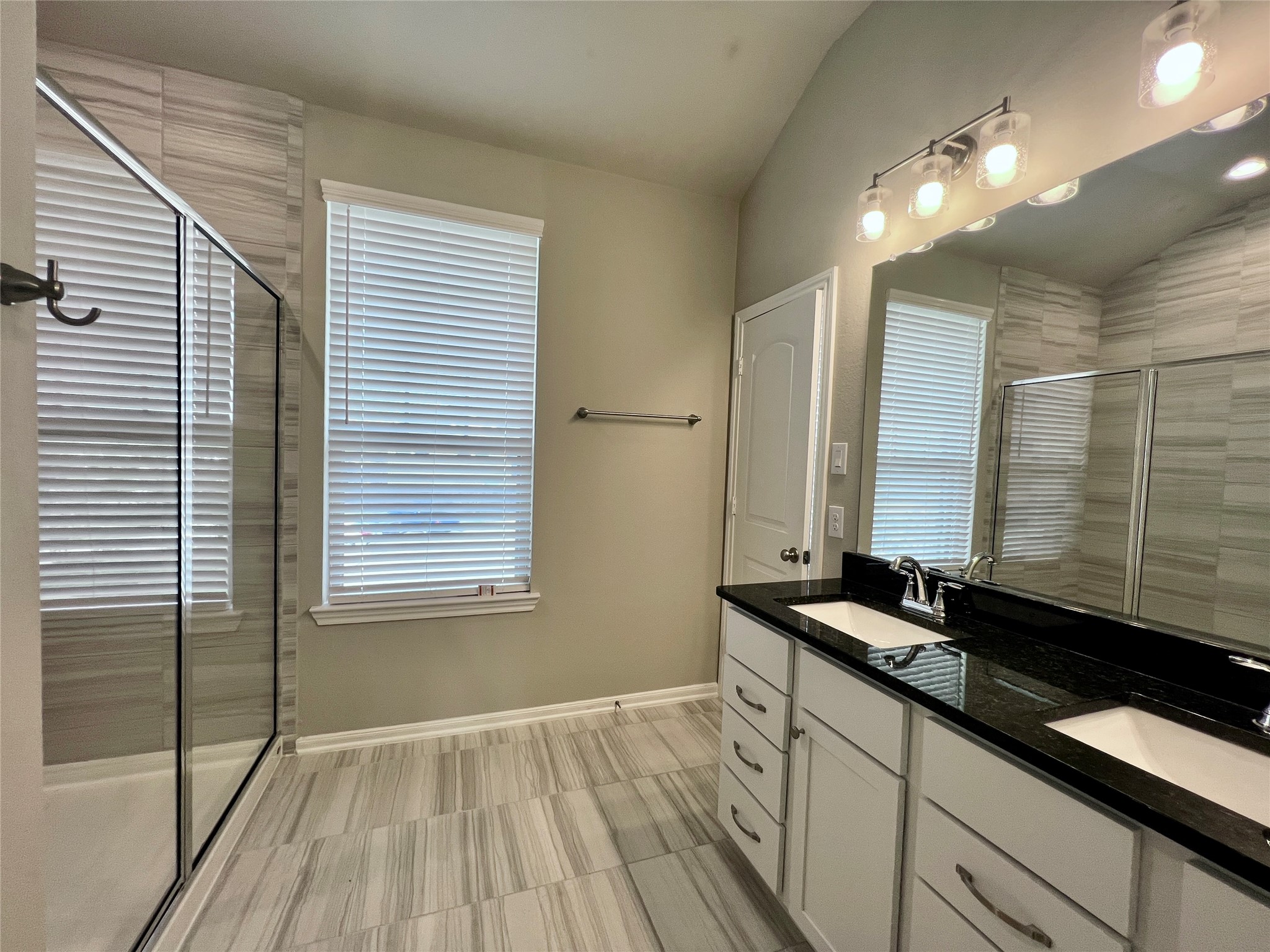 5255 Prairie Terrace Lane Fulshear, TX 77441 - Photo 11 of 28 Primaryr bathroom with two sinks, granite counters and oversized shower.