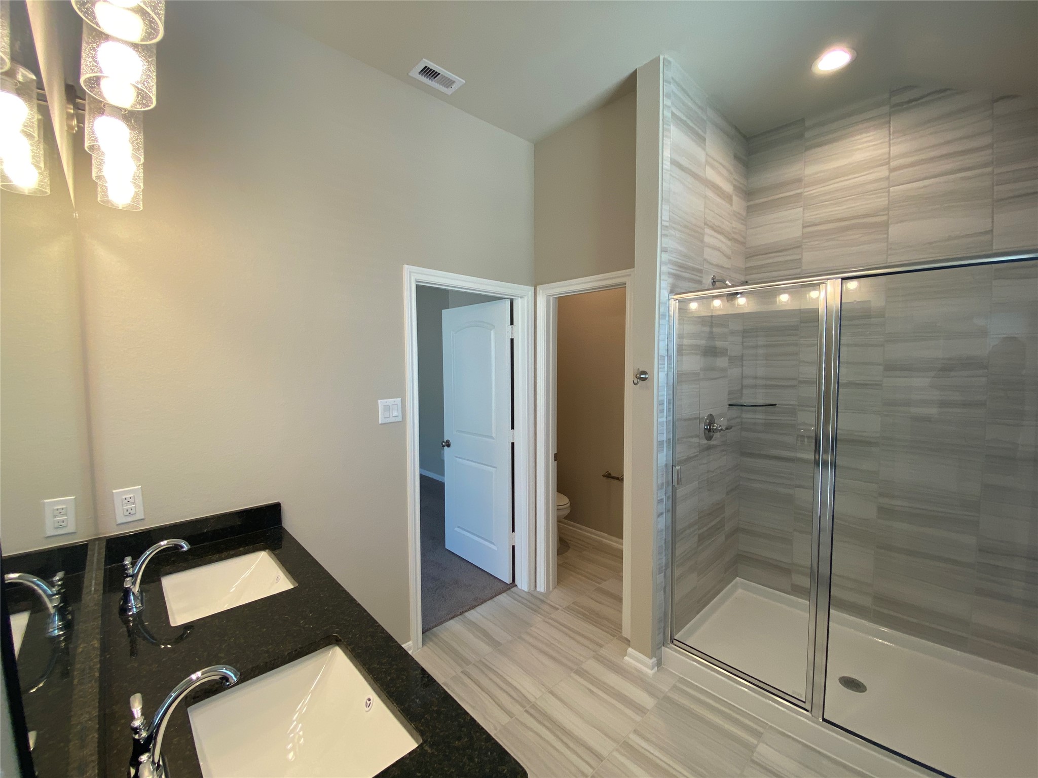 5255 Prairie Terrace Lane Fulshear, TX 77441 - Photo 12 of 28 Oversized shower in primary bathroom.
