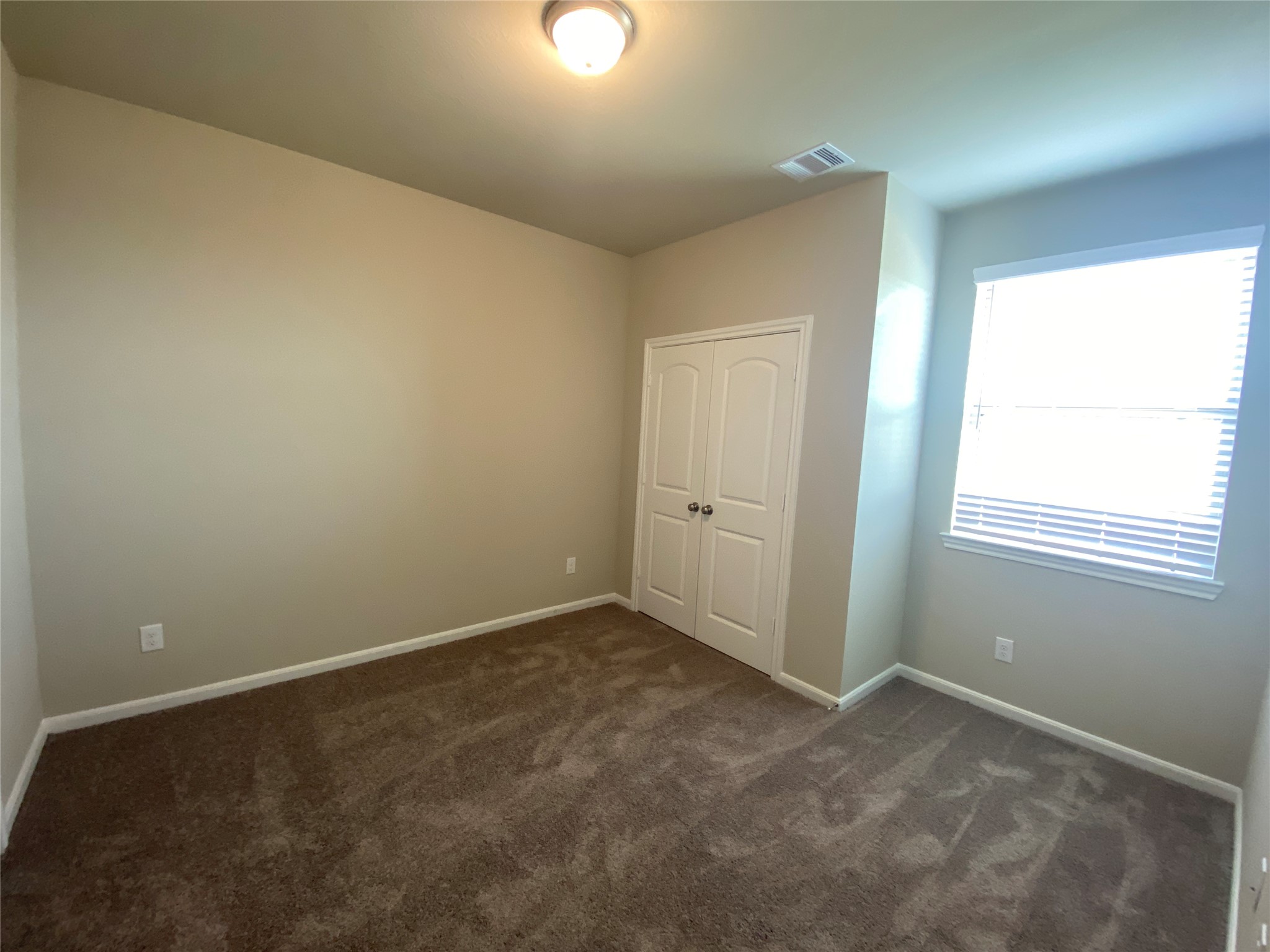 5255 Prairie Terrace Lane Fulshear, TX 77441 - Photo 15 of 28 Another secondary bedroom.