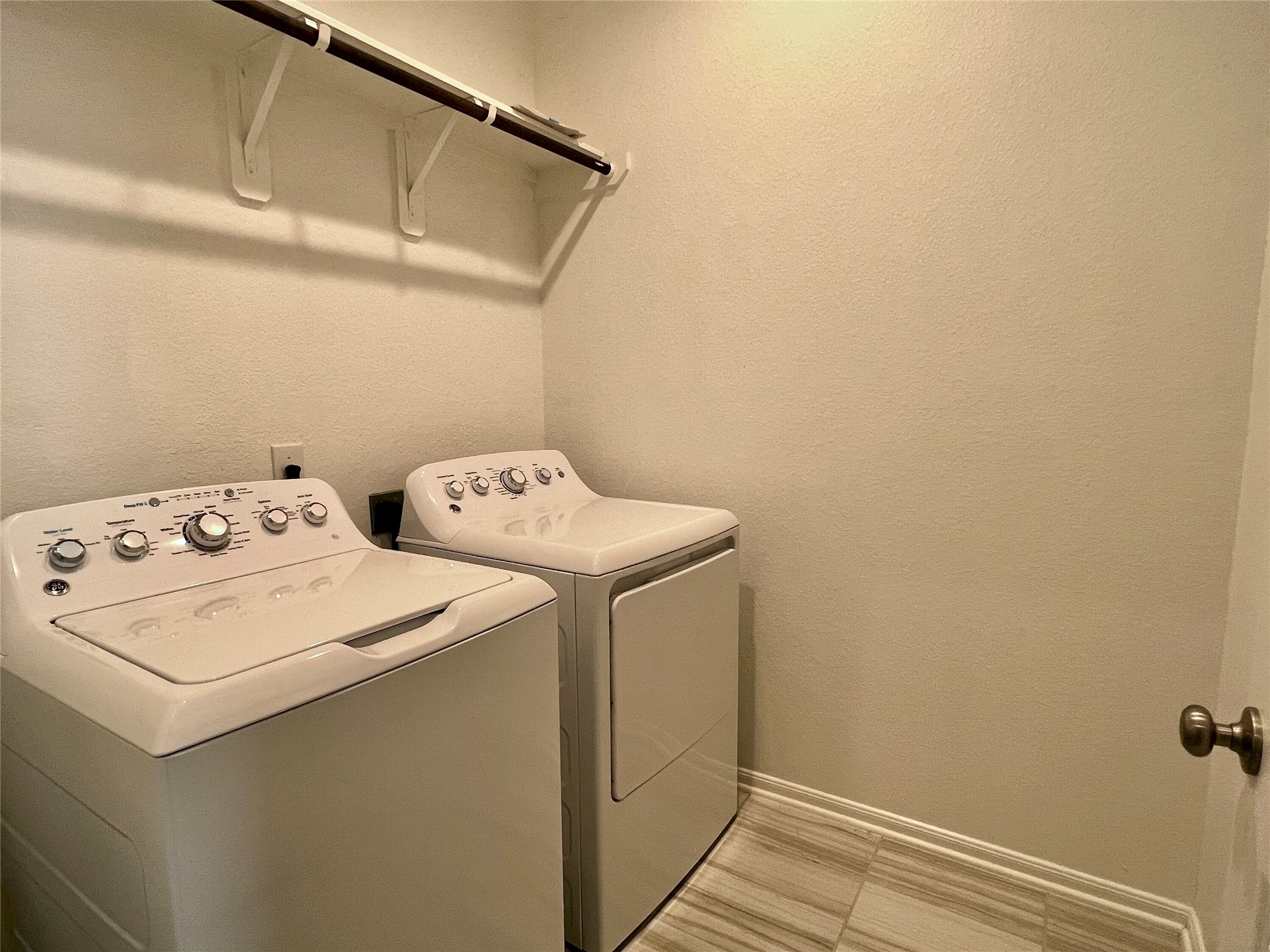 5255 Prairie Terrace Lane Fulshear, TX 77441 - Photo 20 of 28 Laundry room upstairs by secondary bedrooms.