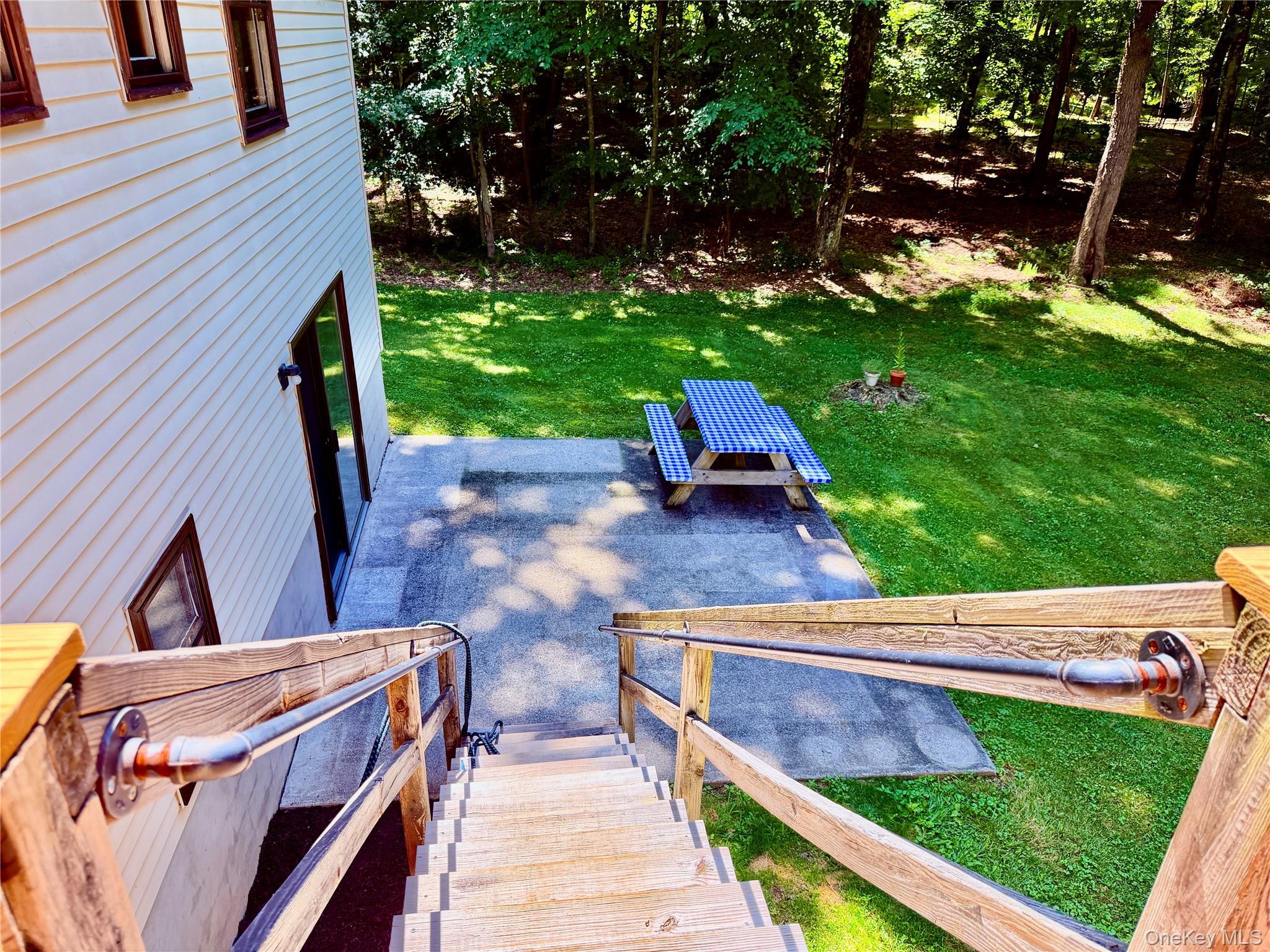 126 Carter Road Pleasant Valley, NY 12569 - Photo 16 of 32 With stairs leading to the downstairs patio.