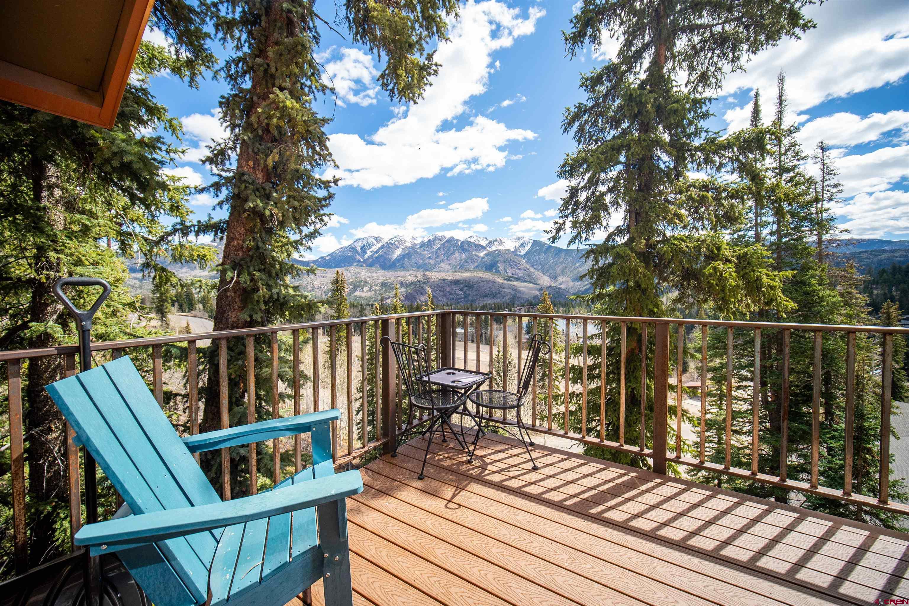 44 Sheol Street, Unit A22 Durango, CO 81301 - Photo 2 of 34 a view of balcony with wooden floor and outdoor seating