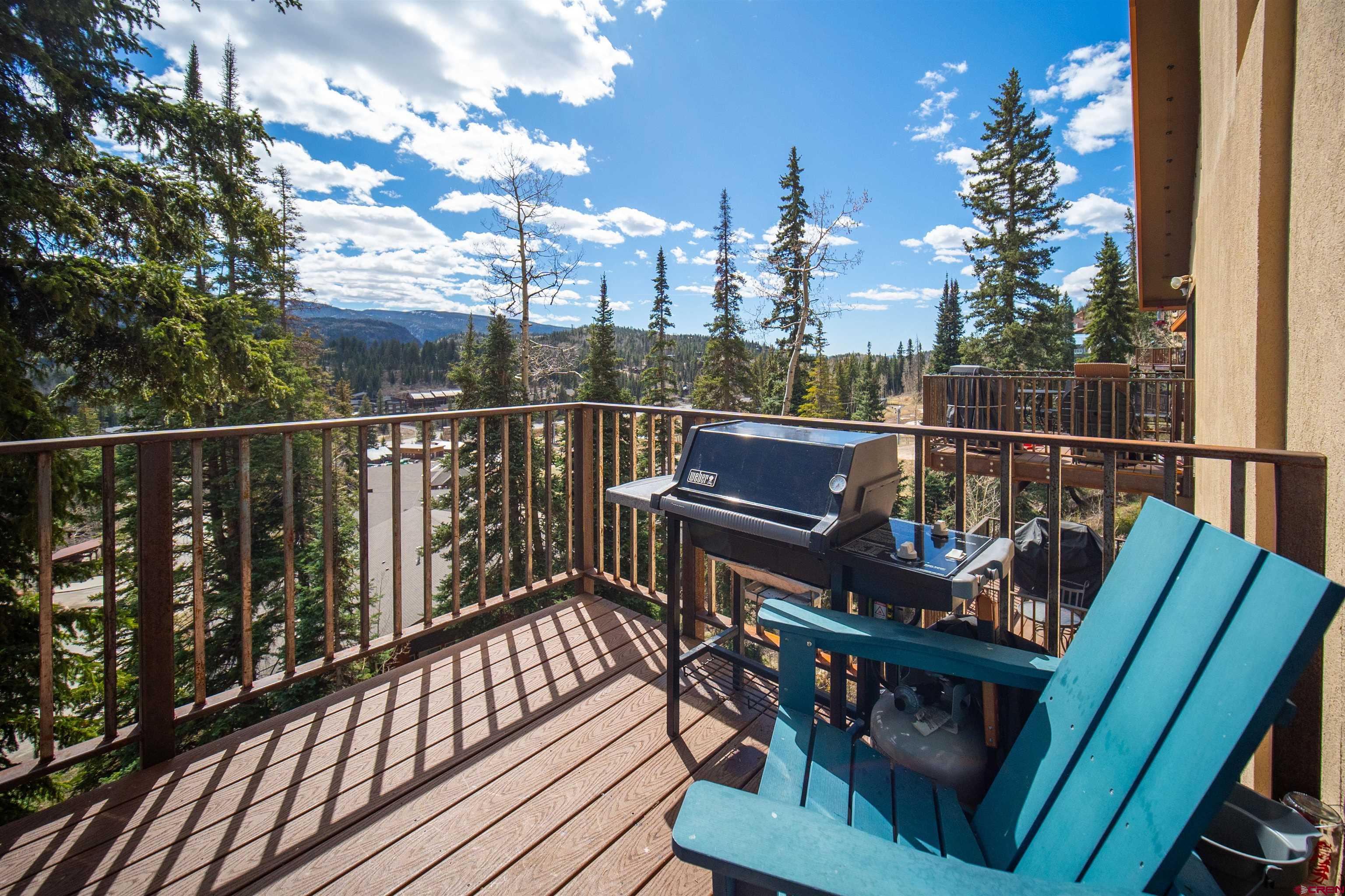 44 Sheol Street, Unit A22 Durango, CO 81301 - Photo 4 of 34 a view of a balcony with wooden floor