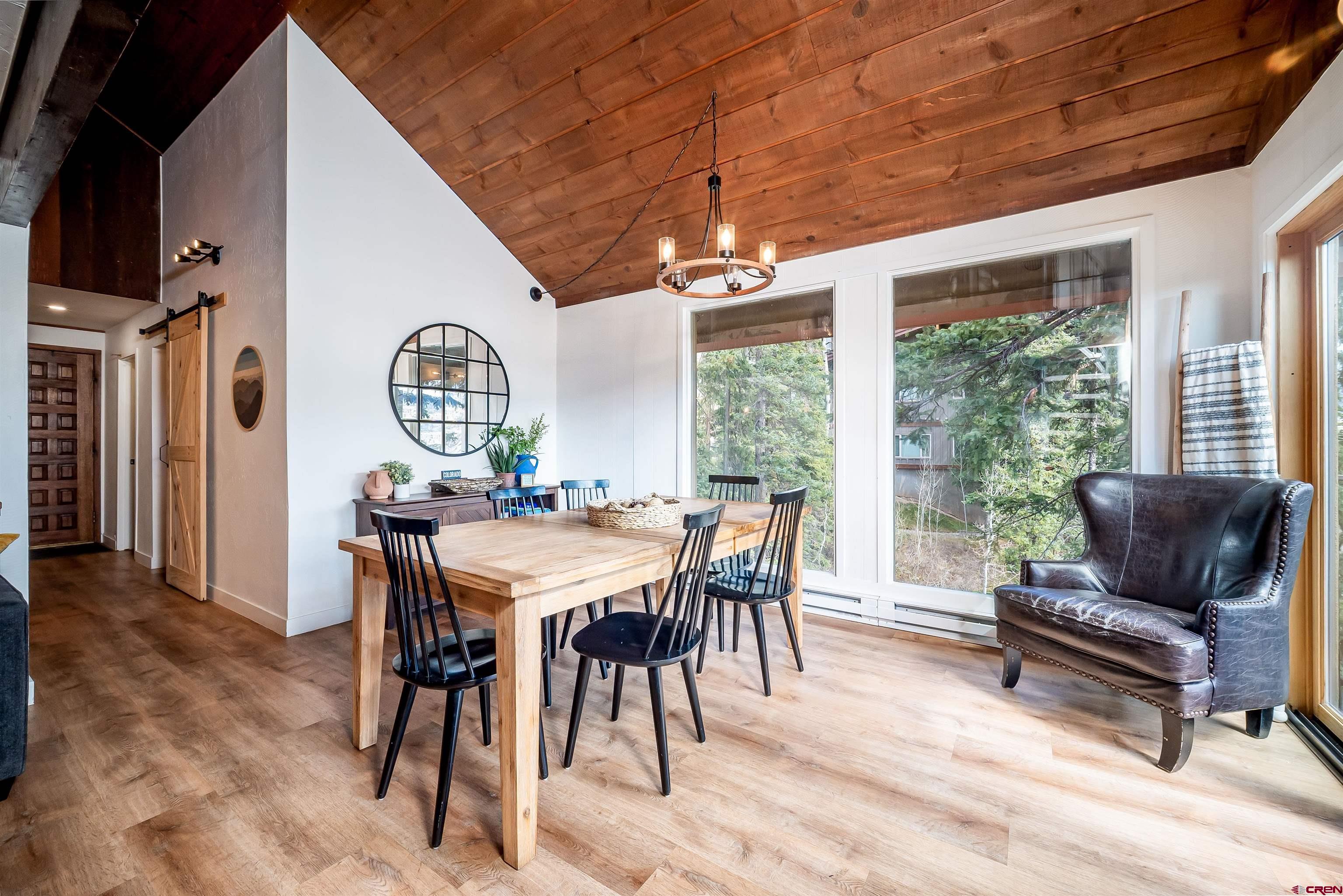 44 Sheol Street, Unit A22 Durango, CO 81301 - Photo 7 of 34 a view of a dining room with furniture window and outside view