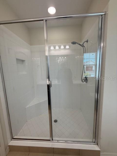 7231 Shadeview Alley Windermere, FL 34786 - Photo 16 of 22 a bathroom with a shower