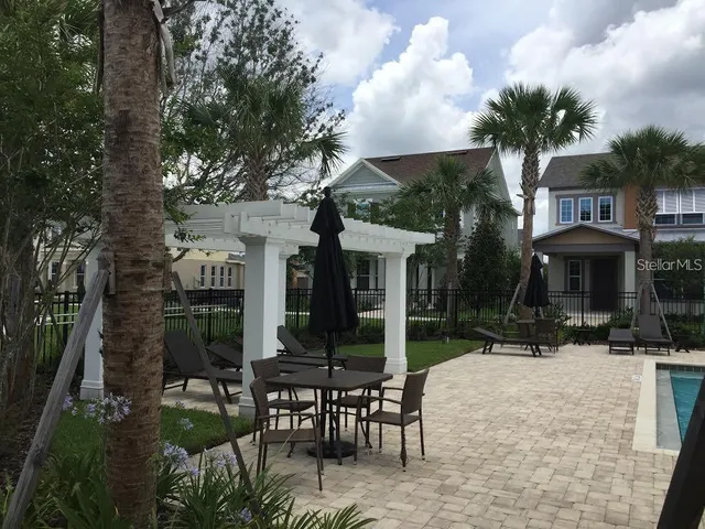 a view of a house with swimming pool