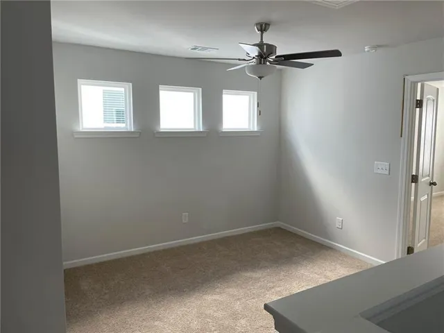 a view of a room with a window