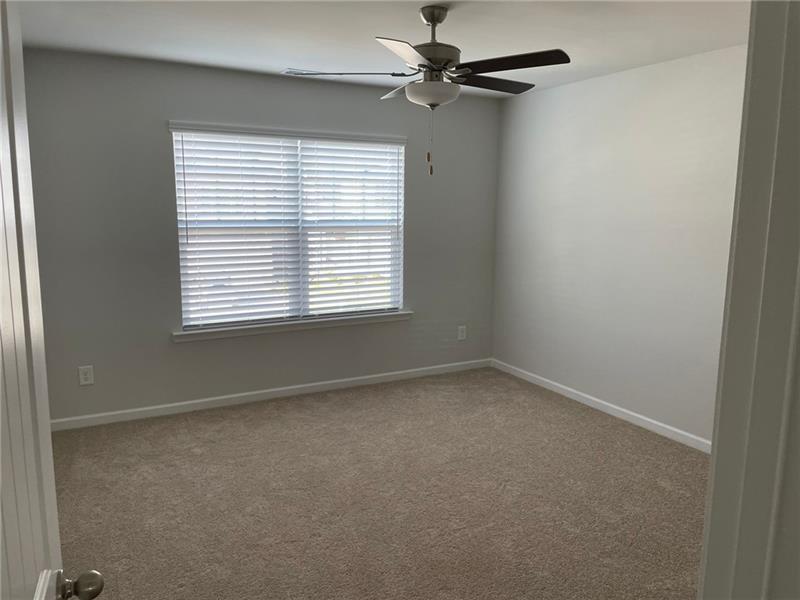 92 Shelter Lane East Dawsonville, GA 30534 - Photo 15 of 19 an empty room with a window