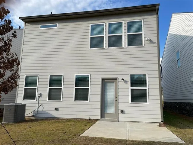 a view of house with outdoor space