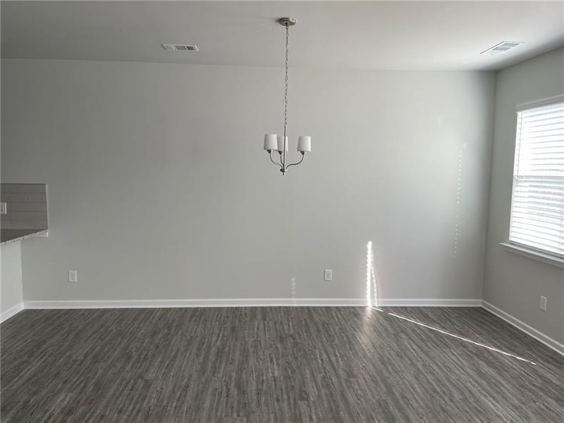 92 Shelter Lane East Dawsonville, GA 30534 - Photo 5 of 19 a view of a room with wooden floor and windows