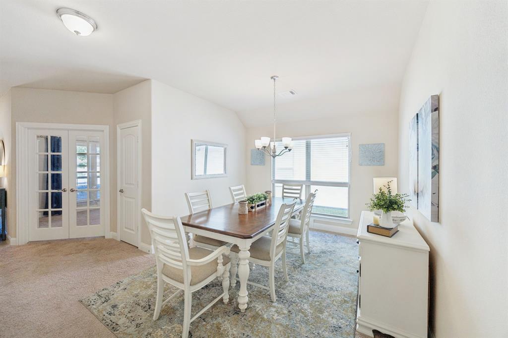 4017 Netherfield Road Frisco, TX 75036 - Photo 5 of 29 a dining room with furniture and window