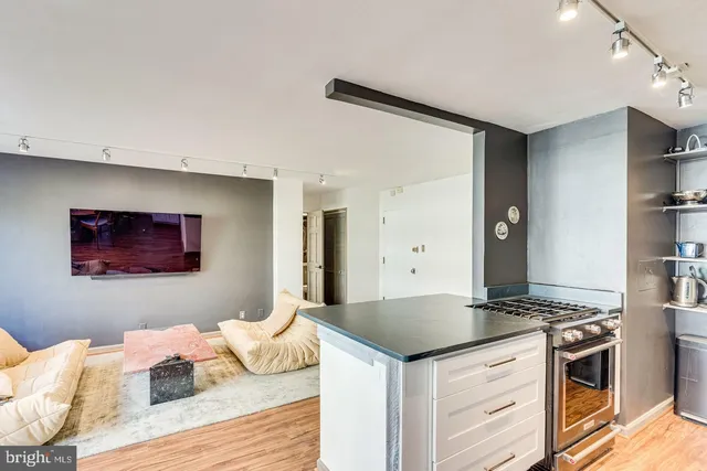 a bedroom with a bed and a couch