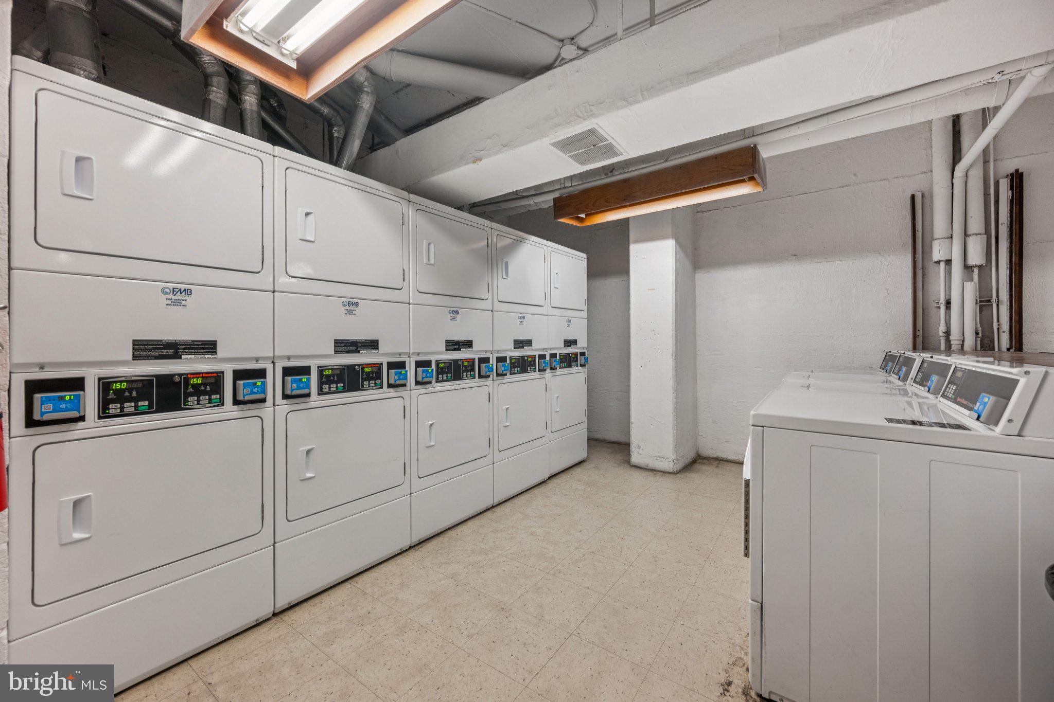 1545 18th Street Northwest, Unit 403 Washington, DC 20036 - Photo 44 of 44 a utility room with cabinets