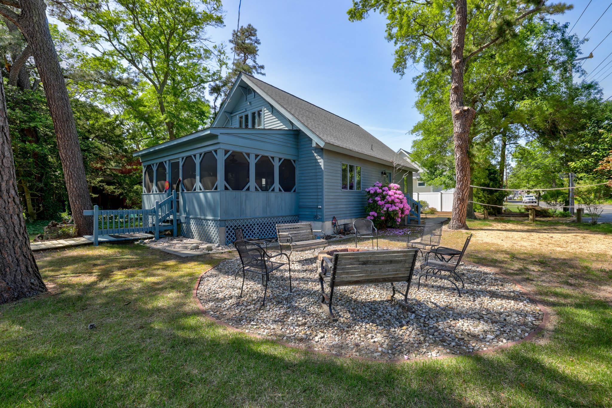 29 Cedarbrook Road Cape May, NJ 08204 - Photo 1 of 28 a view of a house with backyard and sitting area