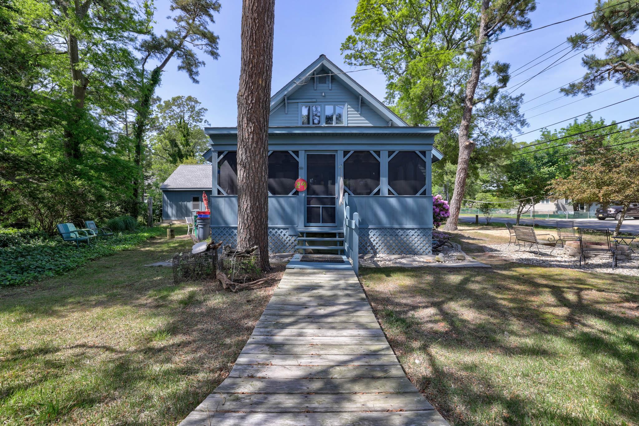 29 Cedarbrook Road Cape May, NJ 08204 - Photo 2 of 28 a front view of a house with garden