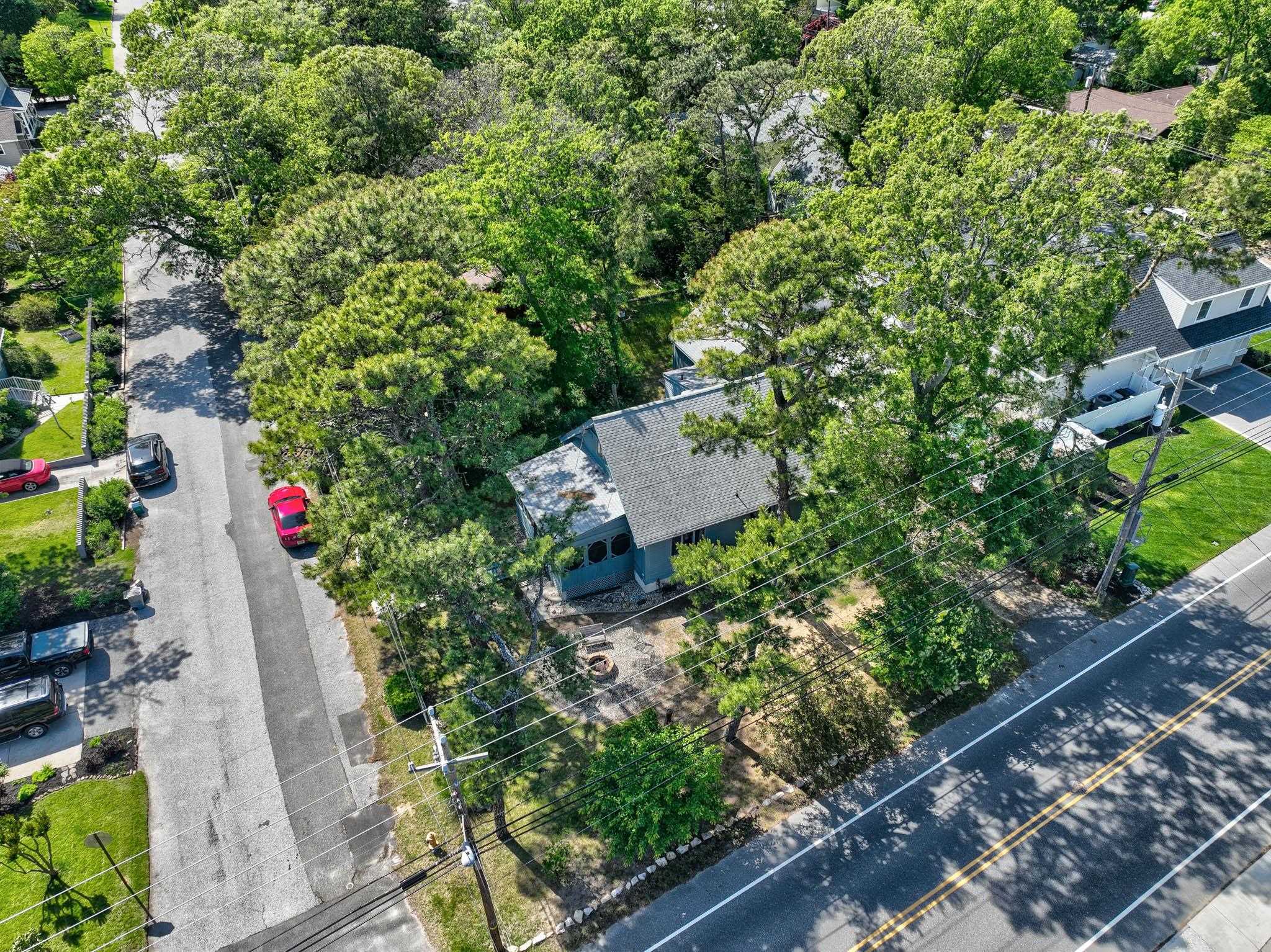 29 Cedarbrook Road Cape May, NJ 08204 - Photo 25 of 28 an aerial view of a house with a yard and garden