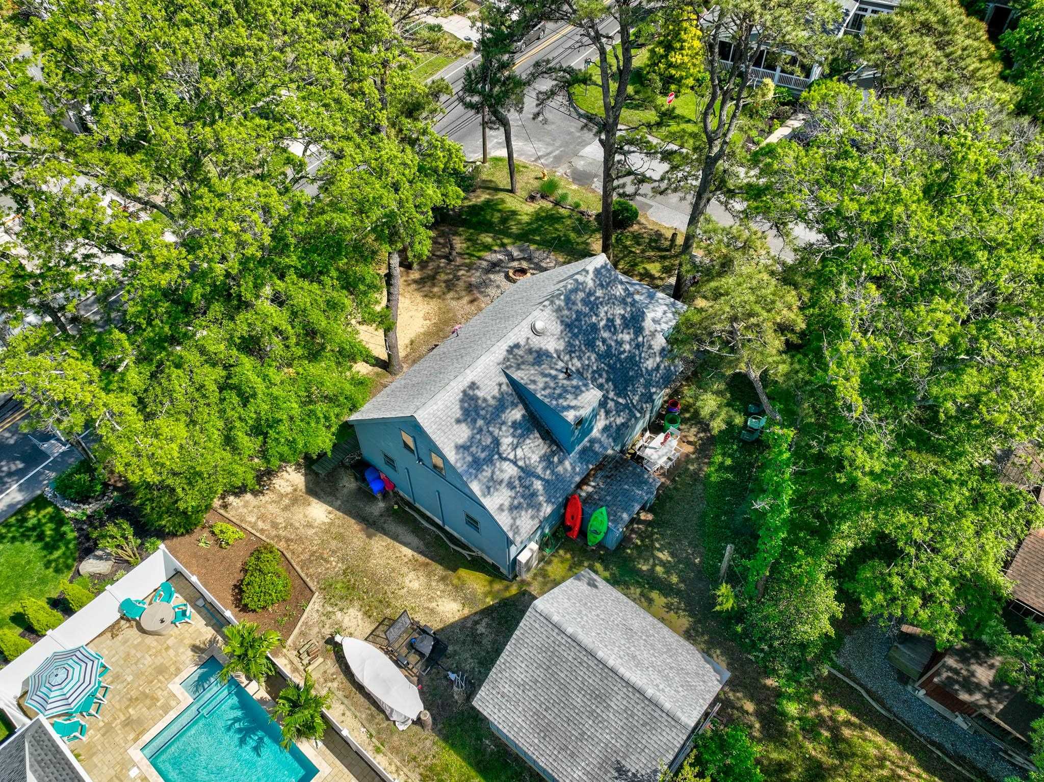 29 Cedarbrook Road Cape May, NJ 08204 - Photo 26 of 28 an aerial view of a house with a yard and garden