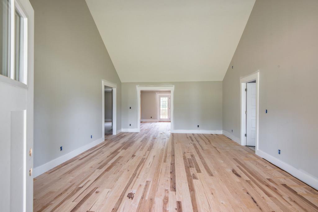 807 Blakemore Road Dickson, TN 37055 - Photo 2 of 26 a view of wooden floor and natural light in a room