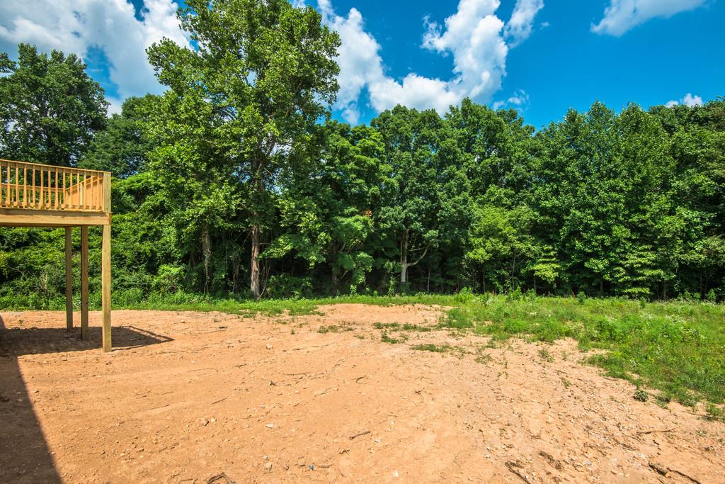 807 Blakemore Road Dickson, TN 37055 - Photo 11 of 26 a street view with a bench
