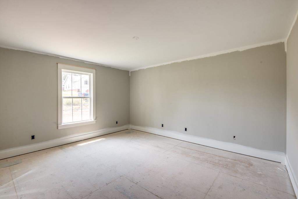 807 Blakemore Road Dickson, TN 37055 - Photo 16 of 26 a view of an empty room with a window