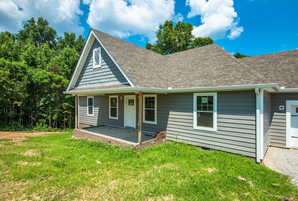 807 Blakemore Road Dickson, TN 37055 - Photo 4 of 26 a view of a house with a yard