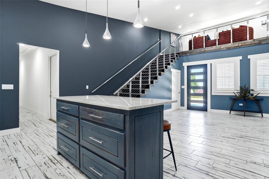 13240 Briar Road Azle, TX 76020 - Photo 11 of 39 a hallway with wooden floor and staircase