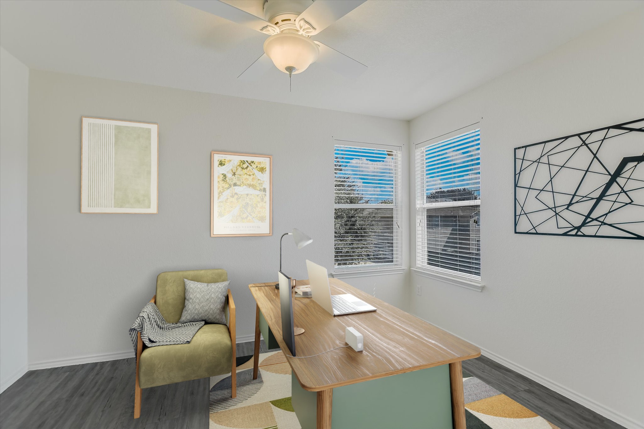 809 Sebastian Bend, Unit B Pflugerville, TX 78660 - Photo 4 of 34 Home office featuring wood finished floors and a ceiling fan
*Virtually Staged*