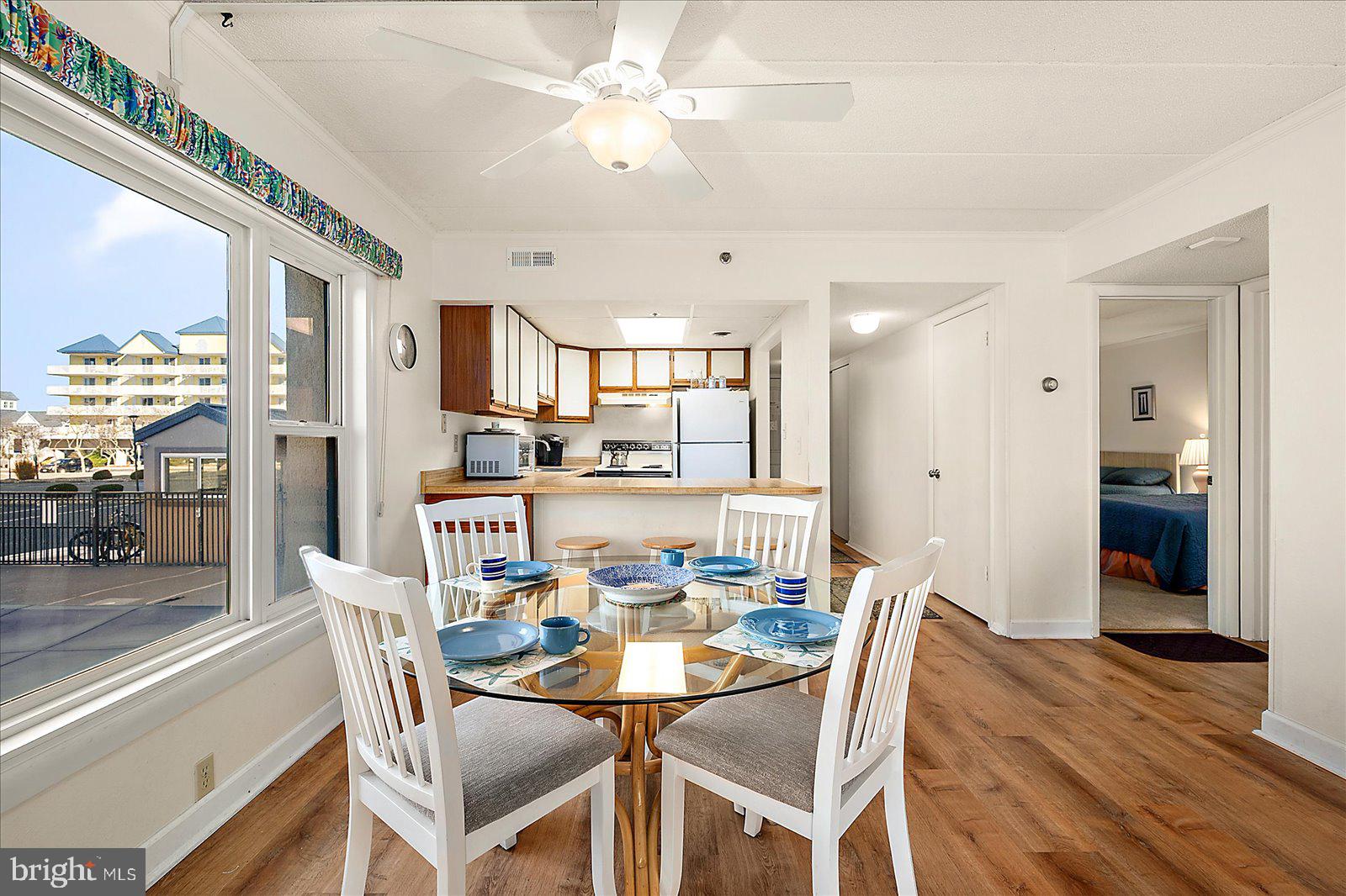 5801 Atlantic Avenue, Unit 101 Ocean City, MD 21842 - Photo 18 of 50 a dining room with furniture and window