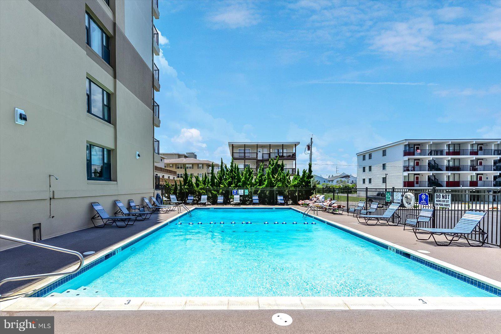 5801 Atlantic Avenue, Unit 101 Ocean City, MD 21842 - Photo 34 of 50 a view of outdoor space yard swimming pool and patio
