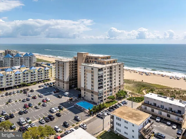 a view of roof with city view