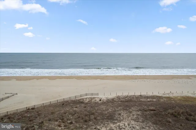 a view of swimming pool and an ocean view