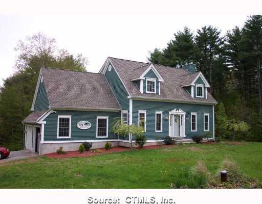279 Wauregan Road Brooklyn, CT 06234 - Photo 1 of 1 Exterior Front. Exquisite detailed trim grace this front view.