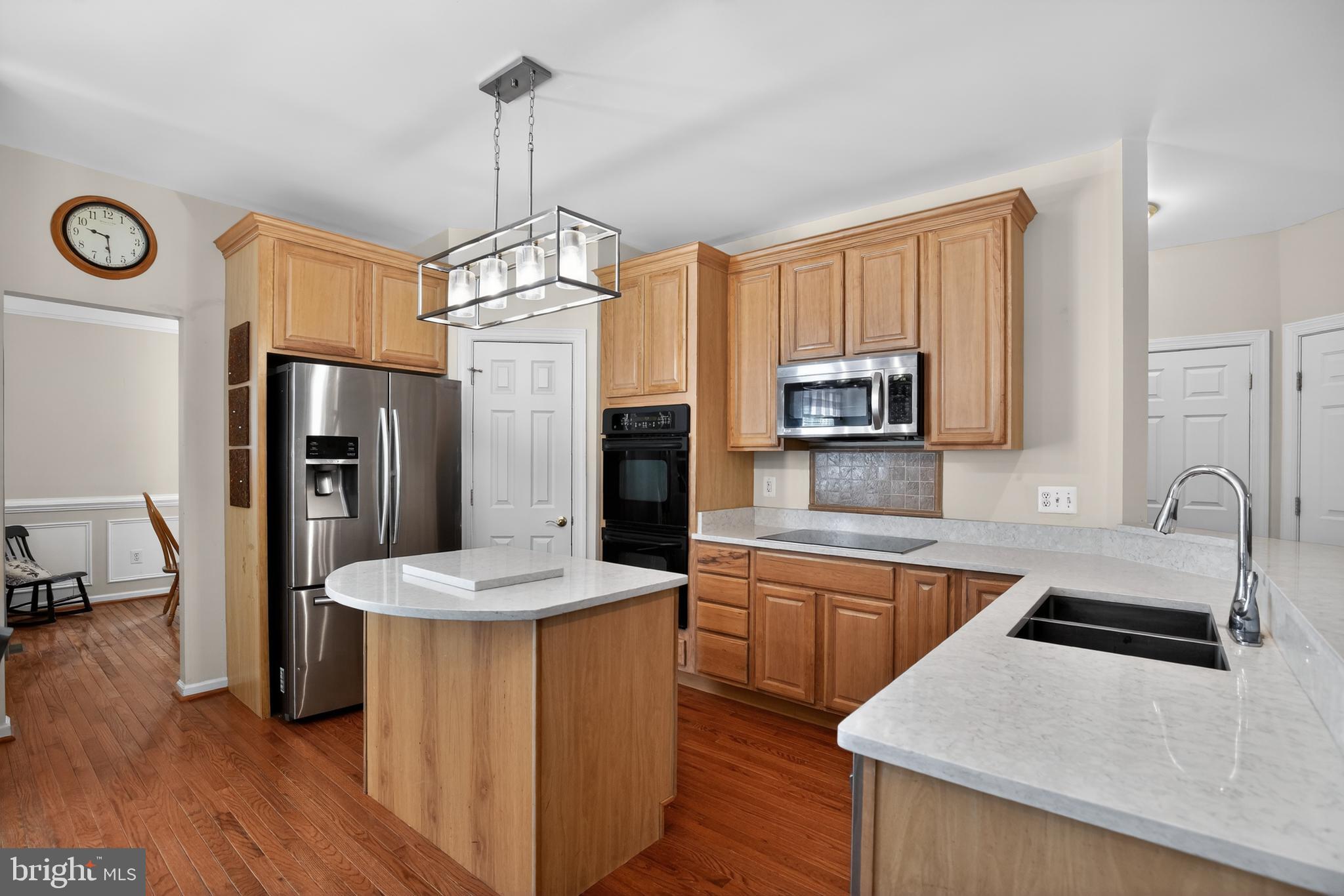 1810 Rudolph Lane Lusby, MD 20657 - Photo 4 of 40 Kitchen w/stainless fridge and cooktop