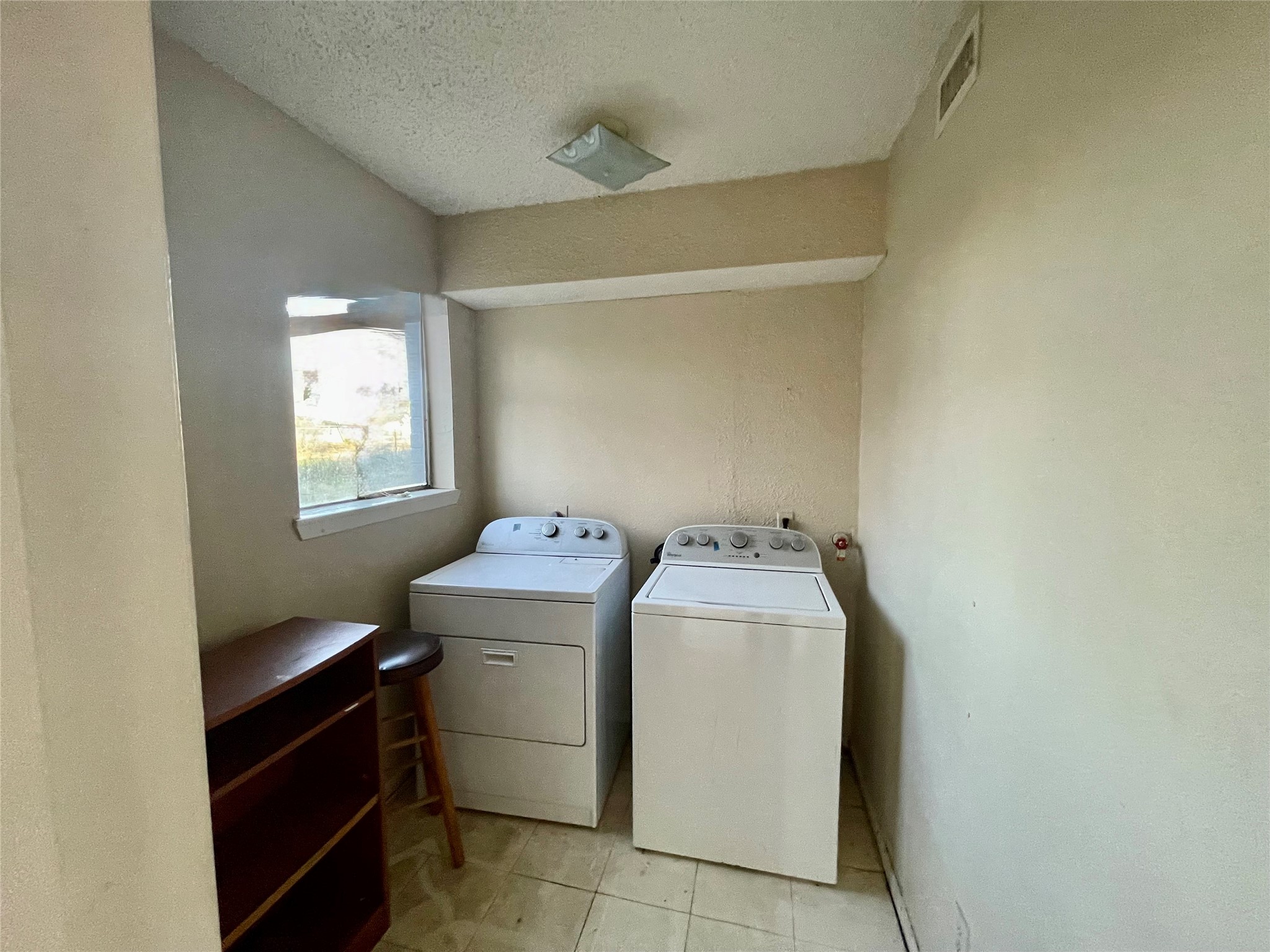 702 Hargest Street, Unit 8 Prairie View, TX 77445 - Photo 6 of 11 a utility room with dryer and washer