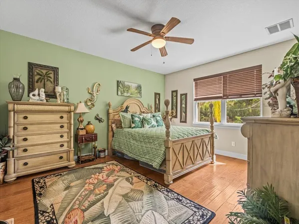 a bed room with a bed and a window