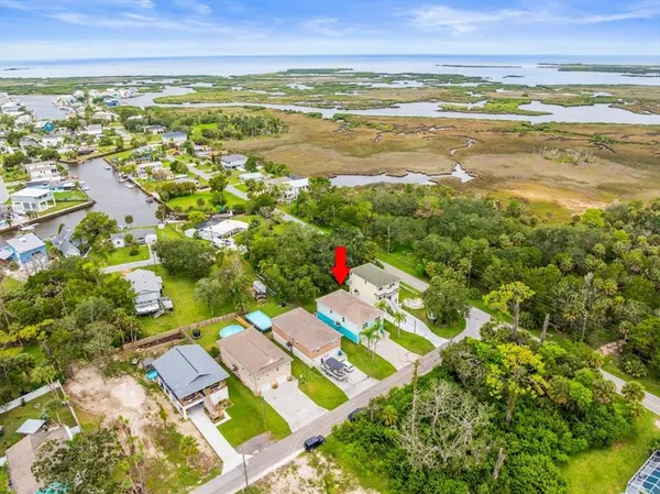 a view of an ocean and a mountain