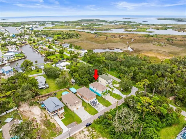 a view of an ocean and a mountain