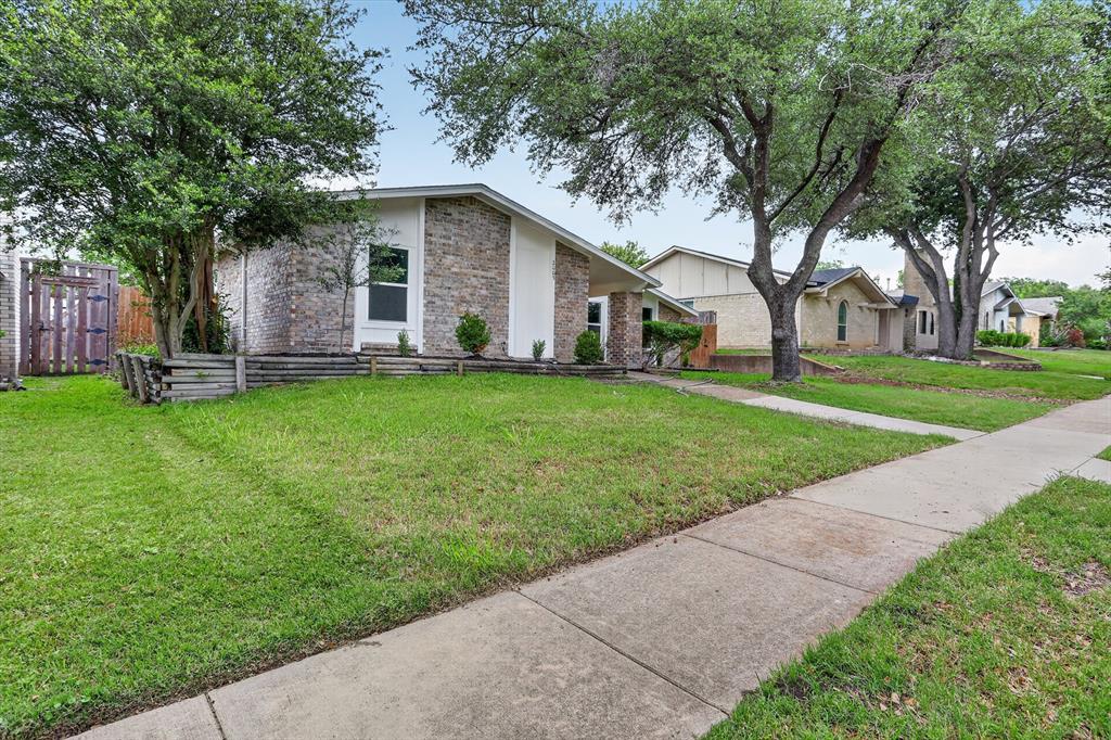 2005 Chestnut Road Carrollton, TX 75007 - Photo 3 of 35 a view of a house with a yard
