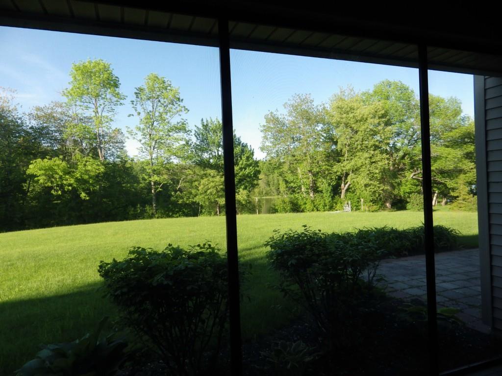 20 Spaulding Point Road Belgrade, ME 04917 - Photo 17 of 32 View from the screened in porch.