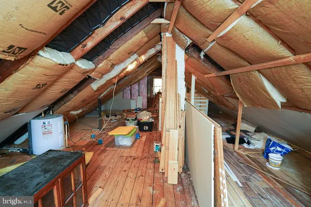a view of a house with wooden deck