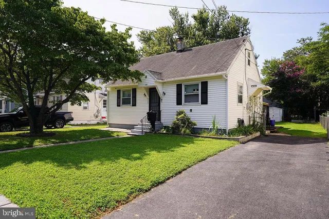 a view of a house with garden and plants