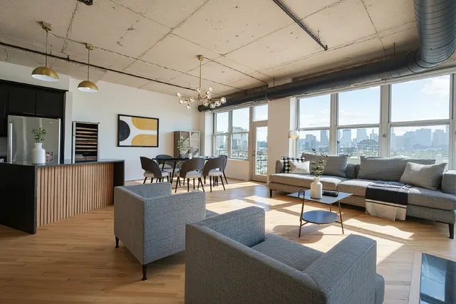 a kitchen with a sink a stove and refrigerator